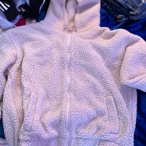 fluffy zip up wool feeling,inside very soft cotton